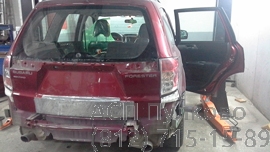 Фото ремонта крышки багажника Subaru